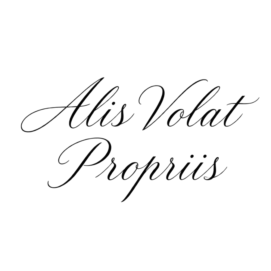 Italic calligraphy tattoo lettering reading Alis Volat Propriis on two lines