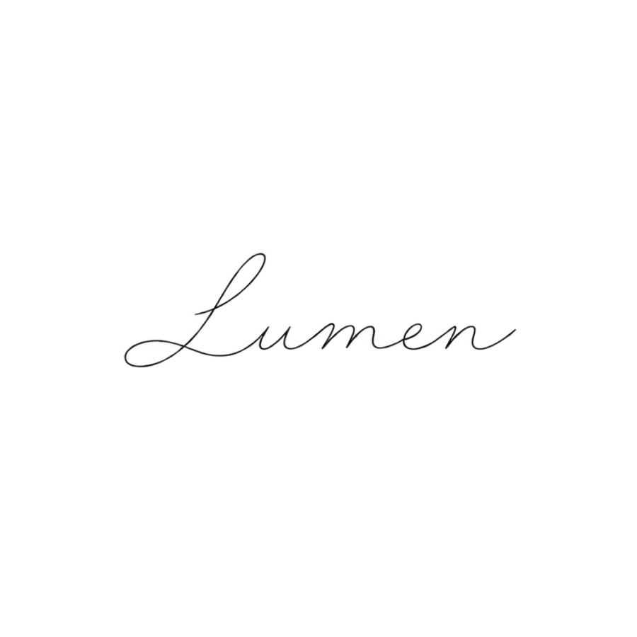 Delicate monoline calligraphy tattoo lettering reading Lumen in hairline weight