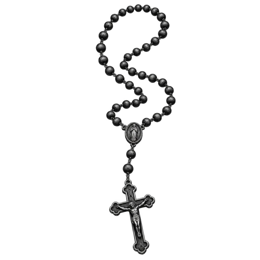 Black and grey rosary tattoo draped in an S curve with crucifix
